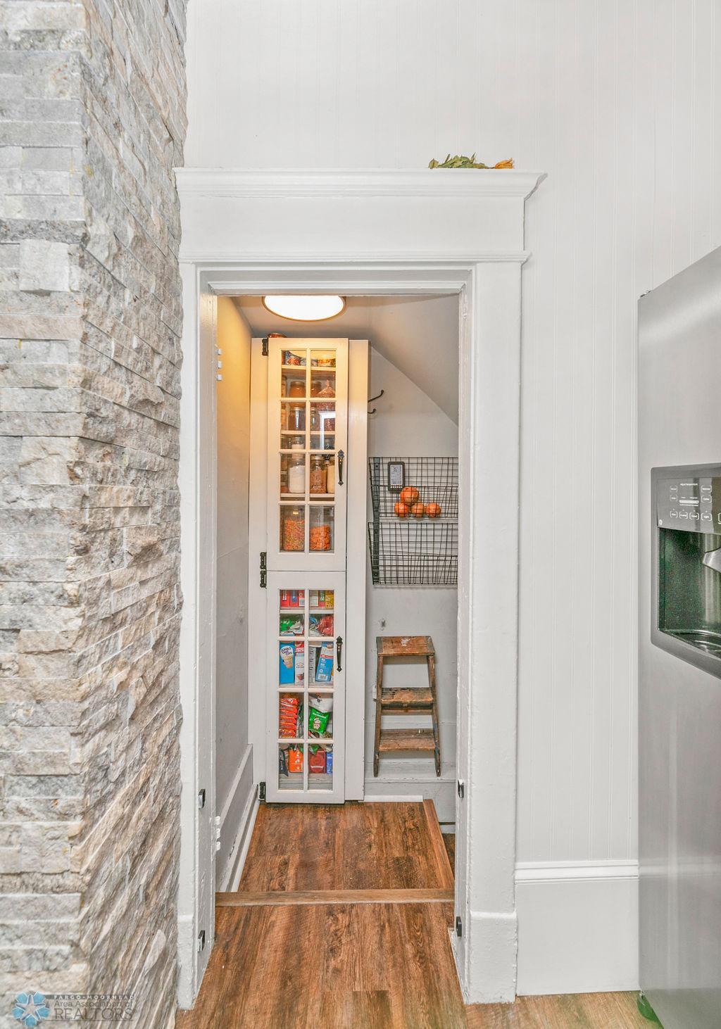 Pantry cabinet & entry to downstairs