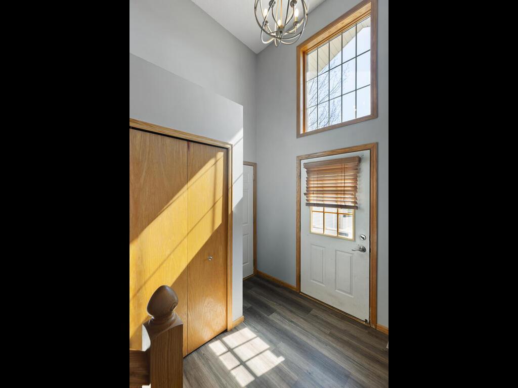 Large Foyer with coat closet and new LVP flooring
