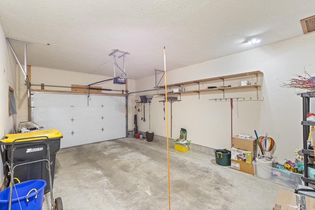The single stall attached garage offers a safe haven for your vehicle while also leaving room for some additional storage