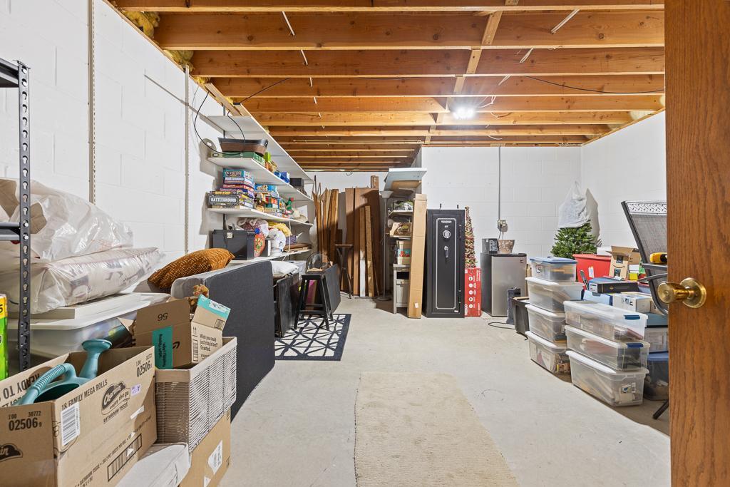 A large storage room offers opportunities for all of your needs - utilize in its current state as a storage space or transform into an office, home gym, workshop area, etc.