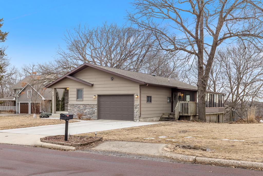 Peep the porch with stunning floor to ceiling windows wrapped the entire length of it.