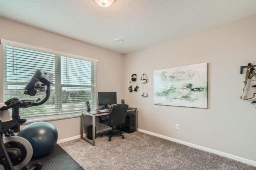 Upper level bedroom can be used as bedroom, office, or work out room