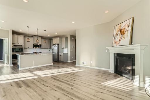 Cozy fireplace and tons of natural light!