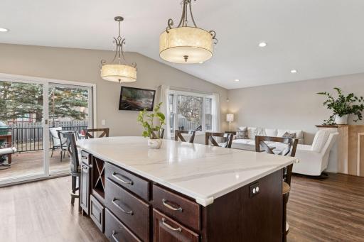 Generous sized center island featuring a wine bottle nook