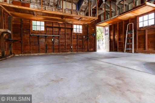 Newer concrete in the garage, apron, and parking pad!