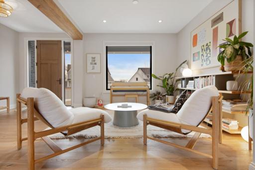Natural light filled, happy, clean lines, and high-end finishes throughout all three levels and sport court.