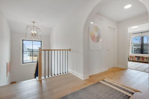 Soaked with light! Enjoy four Bedrooms, three Bathrooms and Laundry Room on this upper level.