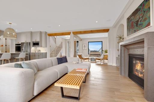 One of two gas fireplaces centers both main and lower level Gathering Rooms.