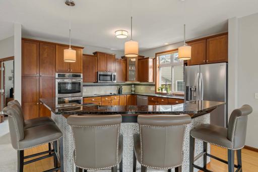 Great for entertaining, the bar-height counter has room for five chairs!