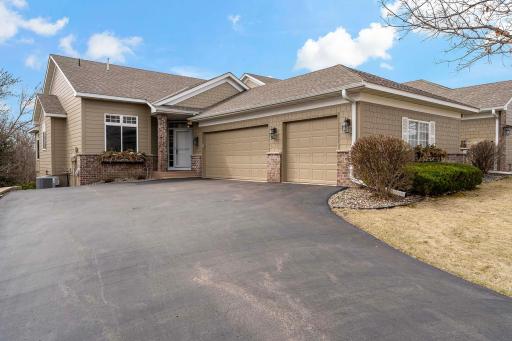 Welcome to 15304 Jeffers Pass NW, Prior Lake Minn. This executive townhome has a three-car garage, and over 3,200 finished square feet!
