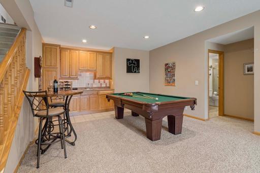 You'll love entertaining - a wet bar, and plenty of storage for all your needs.