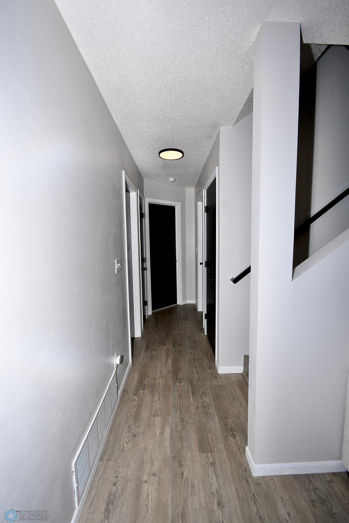 entrance to basment bedrooms and bathroom