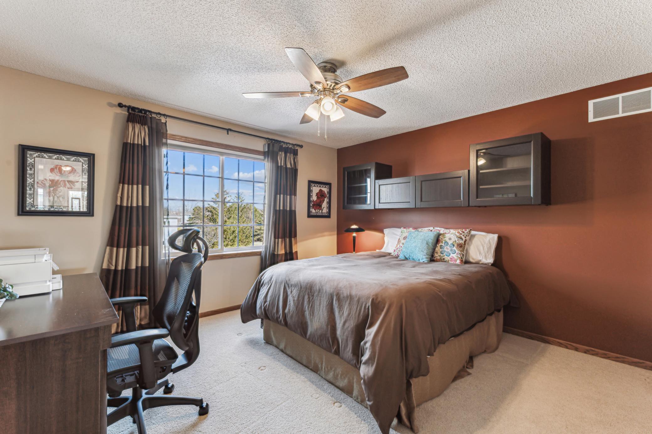 One of three bedrooms on the upper level.