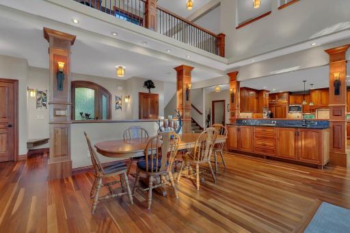 The meticulously designed open-concept dining area is ideal for hosting family and friends. With its warm ambiance and carefully curated design features, this space creates the perfect backdrop for memorable gatherings.