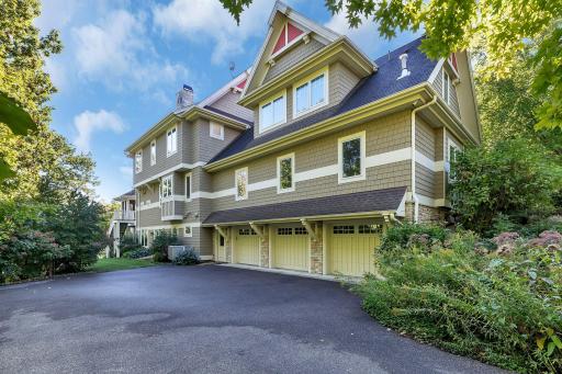 The spacious, heated 3-car garage on the lower level is easily accessible from the basement and lower driveway.