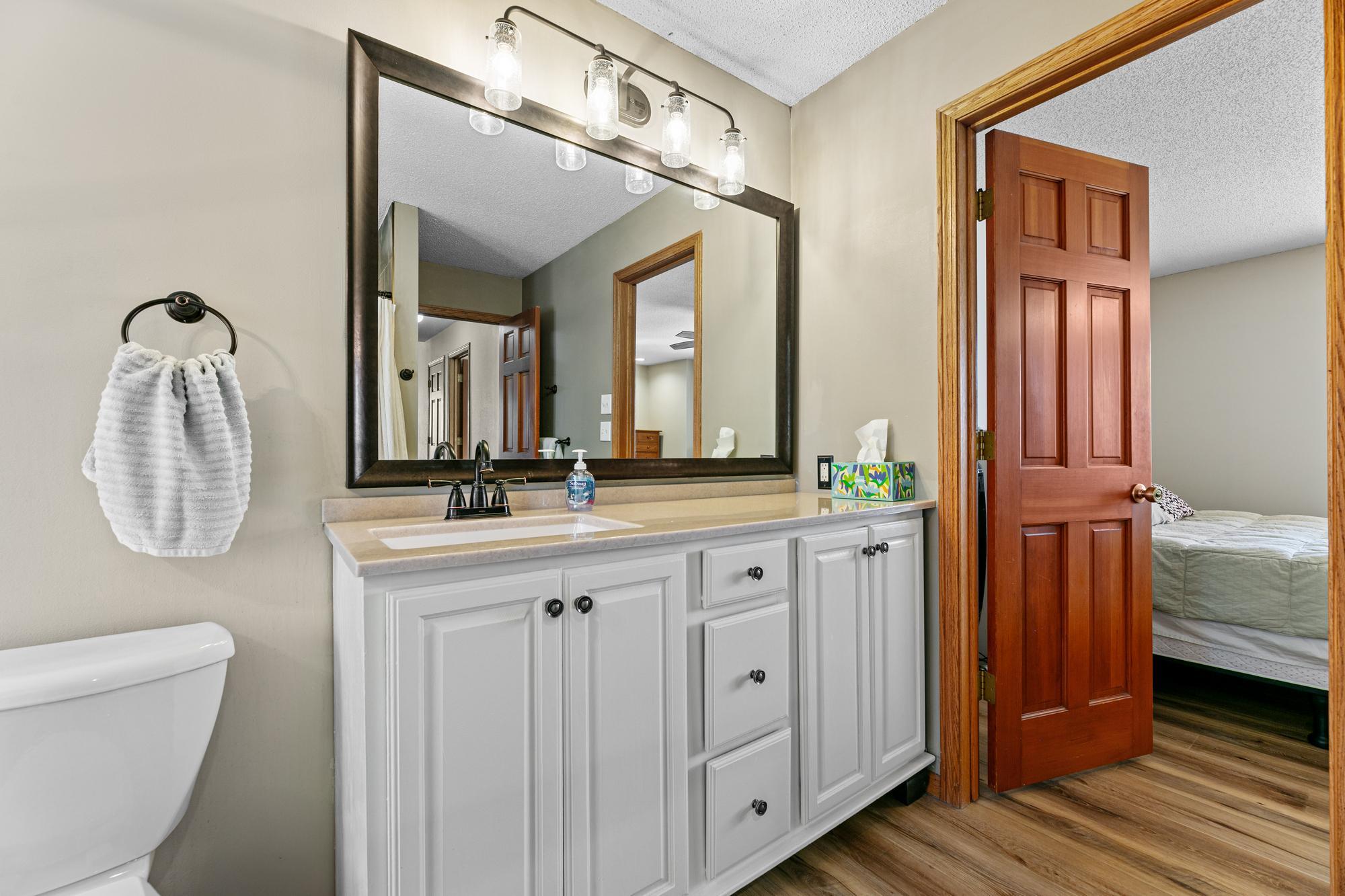 Updated vanity and light fixture.