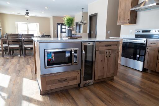 Kitchen island complete with Microwave and wine refrigerator