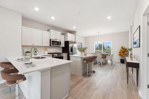 Kitchen. Virtually staged. Photos of same home, but selections may not be identical.