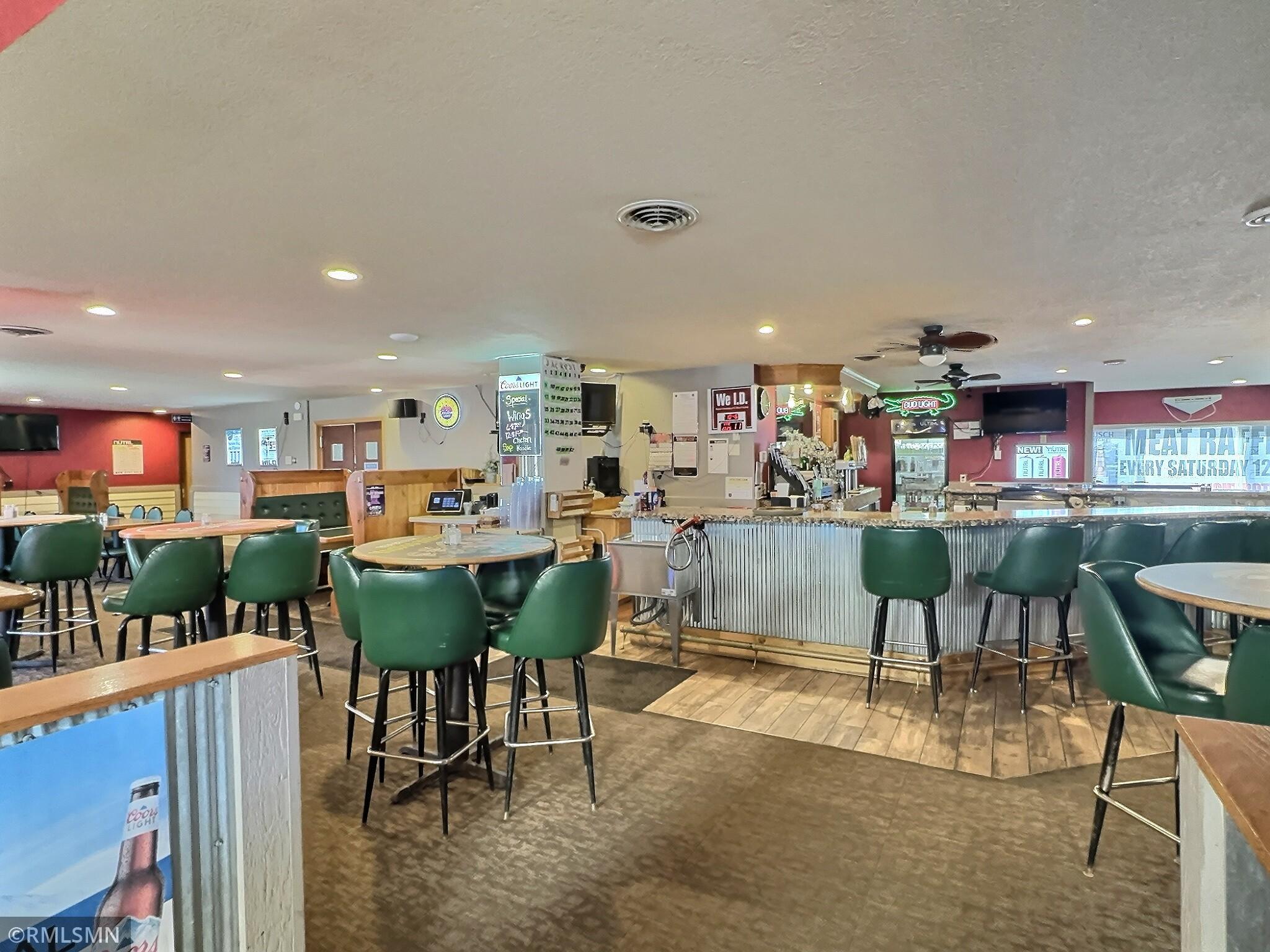 Another view of the bar and the doors you see is the access to the kitchen.