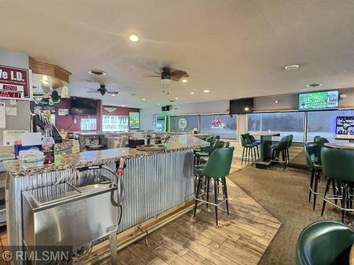 The bar opens to the entire restaurant so bartenders can keep an eye on everything.