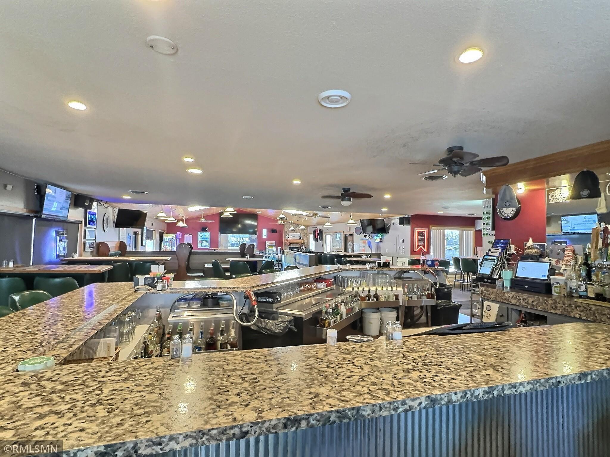 View from the back side of the bar to the big screen.