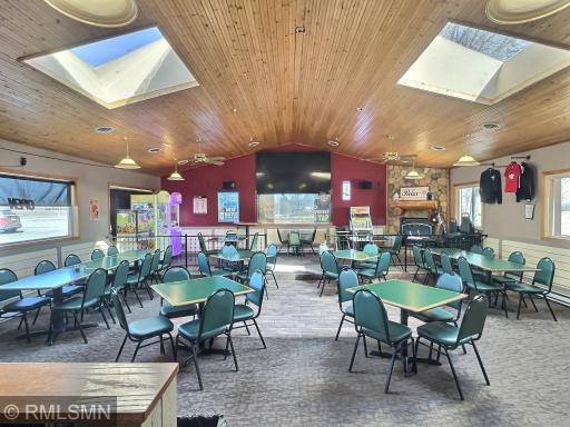 The interior features nine TVs, nine high-top tables, nine booths, and nine large tables, with the bar itself surrounded by 15 barstoolsâperfect for socializing.