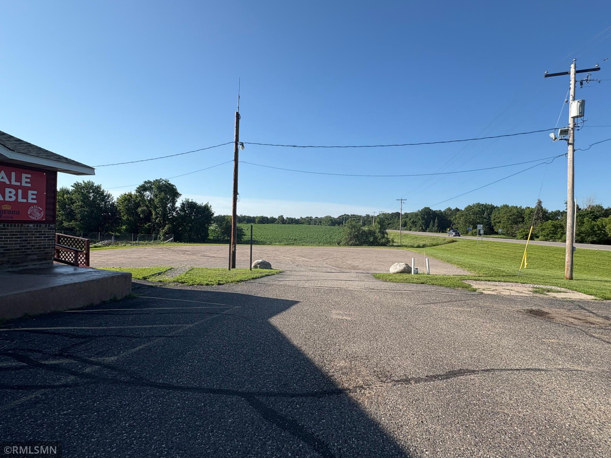 Front and rear parking areas are asphalt along with a large gravel parking lot to the side. The gravel parking lot is great for customers that are stopping with a trailer, boat or RV making it easy for them to stop and grab a bite to eat.