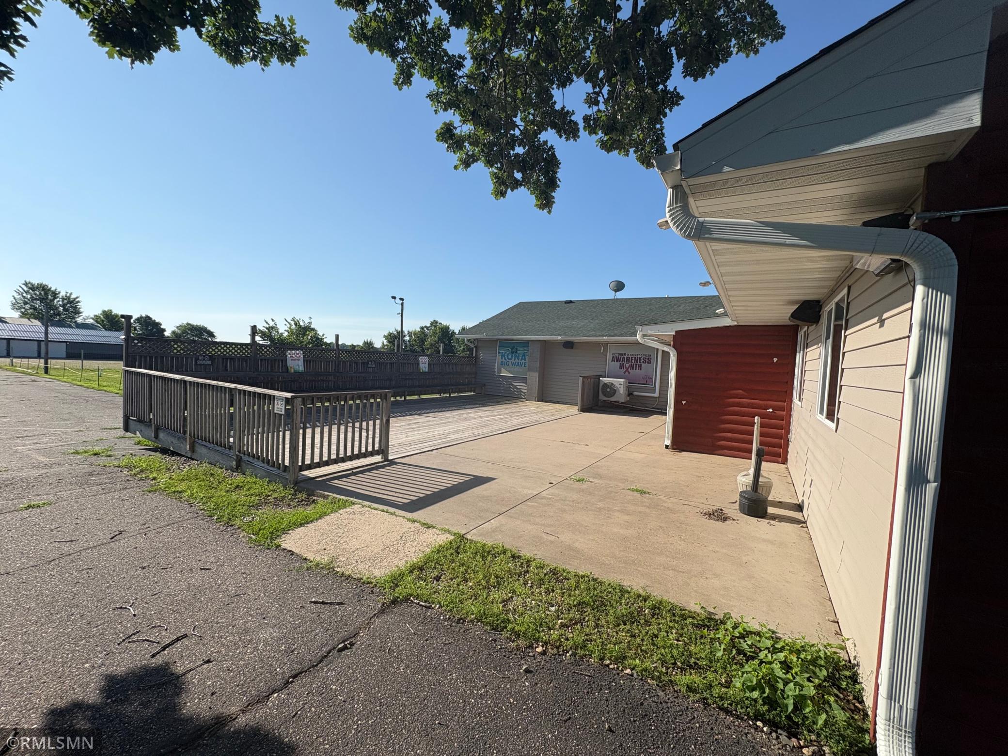 Step outside to the spacious back deck, which seats approximately 25 guests and offers a great spot for outdoor dining experience.