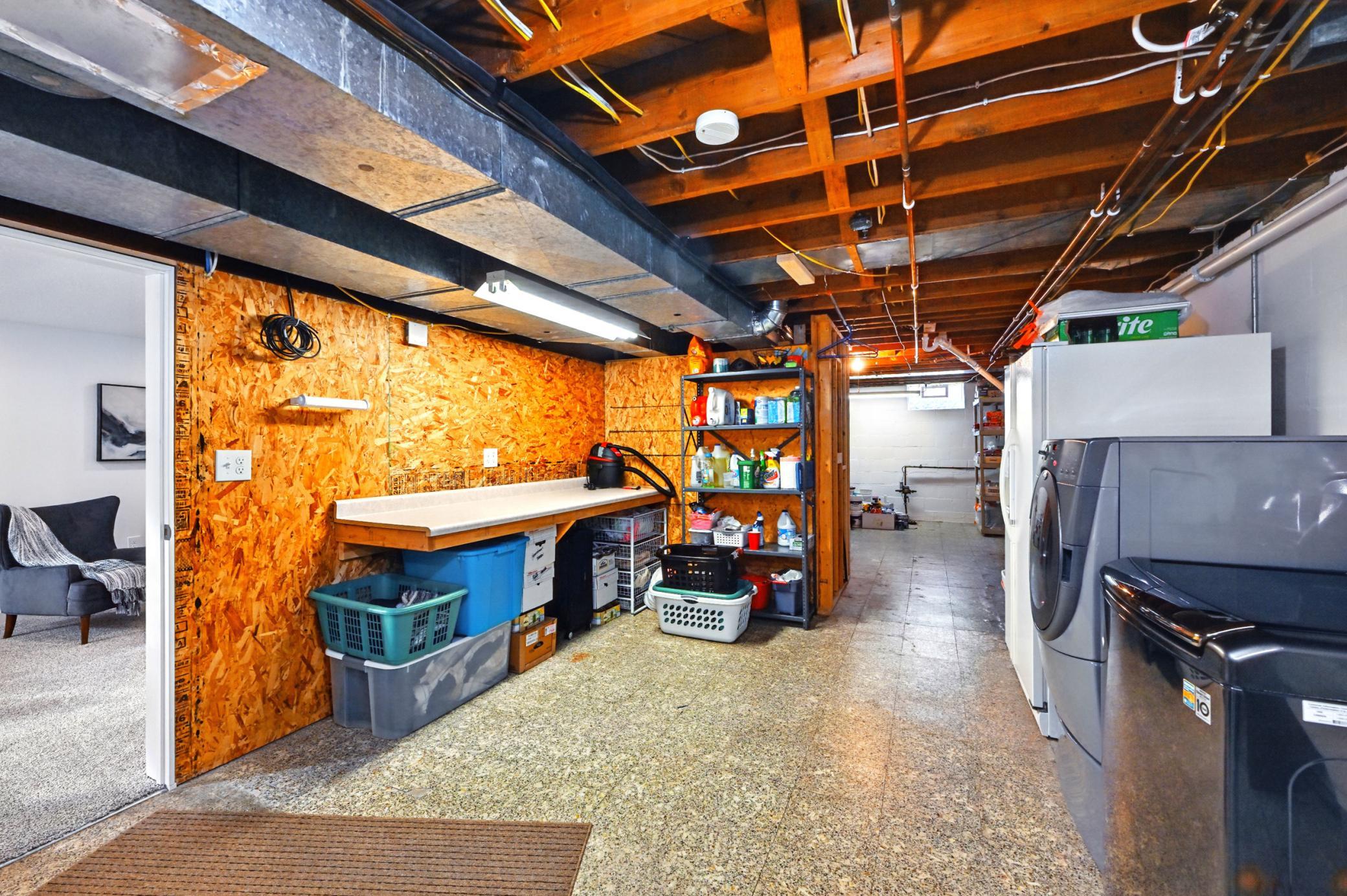 Large lower level laundry and storage room