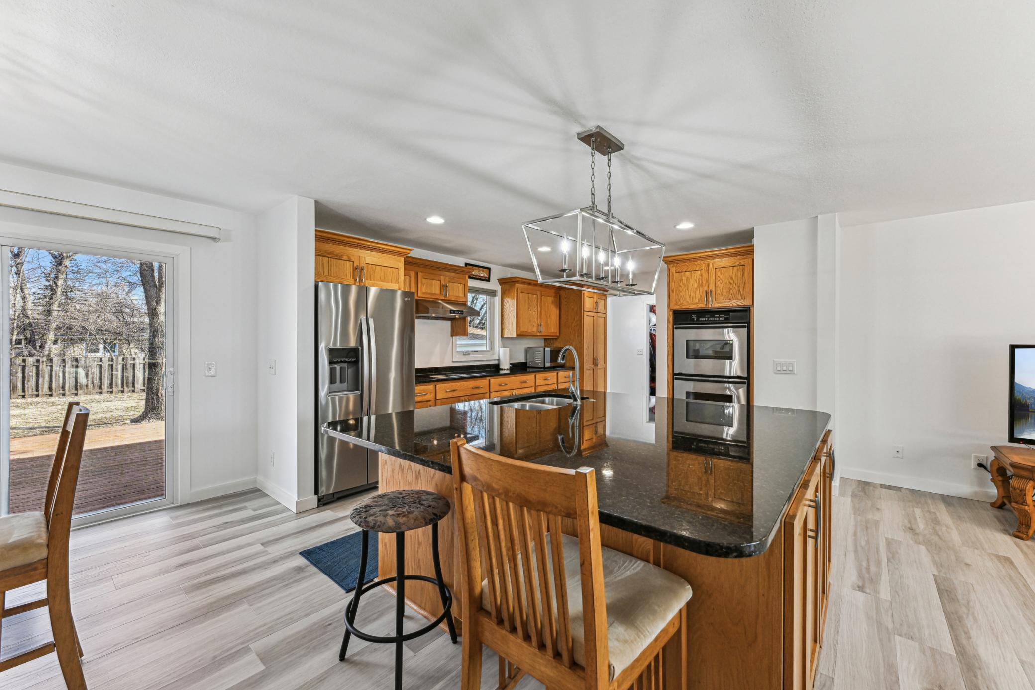 Main level kitchen with a breakfast bar and ample storage