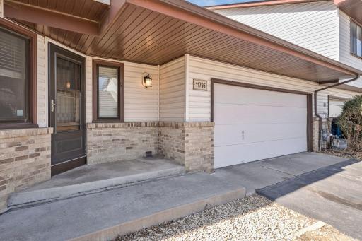 The covered front entry offers a warm welcome.