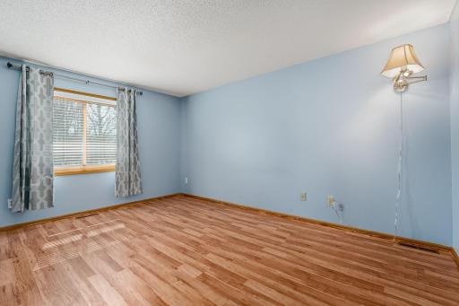 The primary bedroom walks through to the full upper level bath.