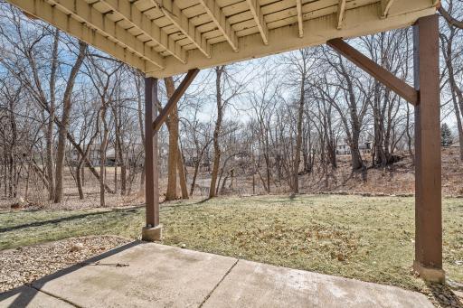 Step out onto the concrete patio—an ideal spot for grilling, lounging, or enjoying peaceful evenings surrounded by nature.