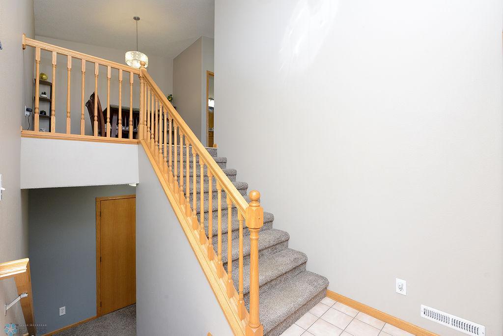 Foyer to upper level & lower level