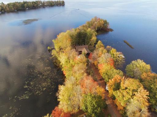 Your new home peaking out of the fall trees