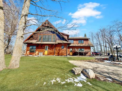 Enjoy sunsets on this serene patio overlooking your west lake shore.