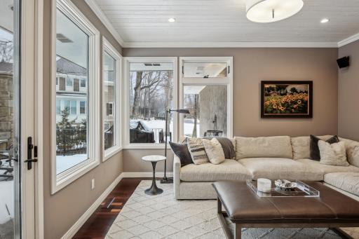 Cozy sunroom with in floor heat and access to back deck.