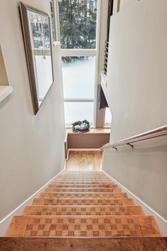 Beautiful detailing on staircase and wonderful natural light.