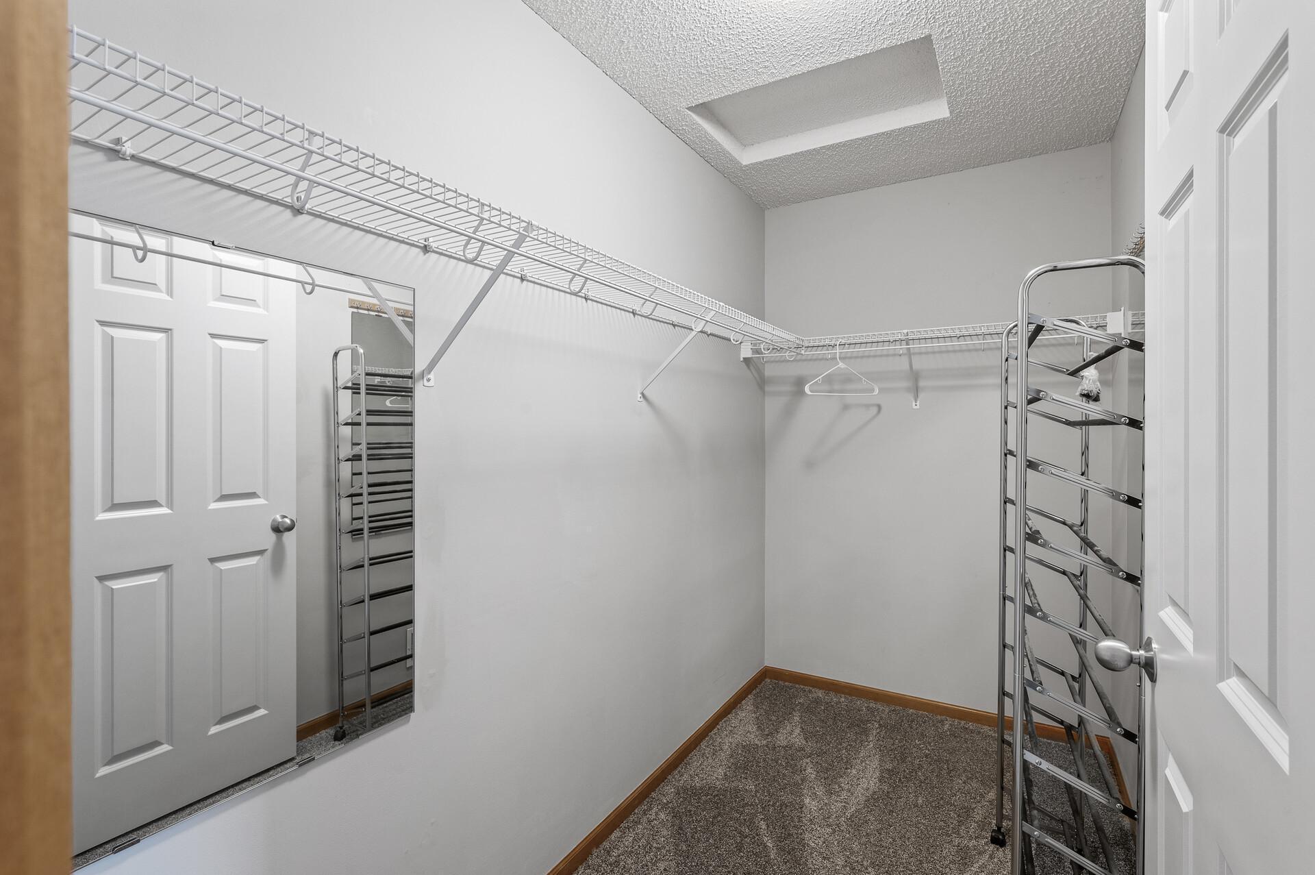Primary Bedroom Walk in Closet