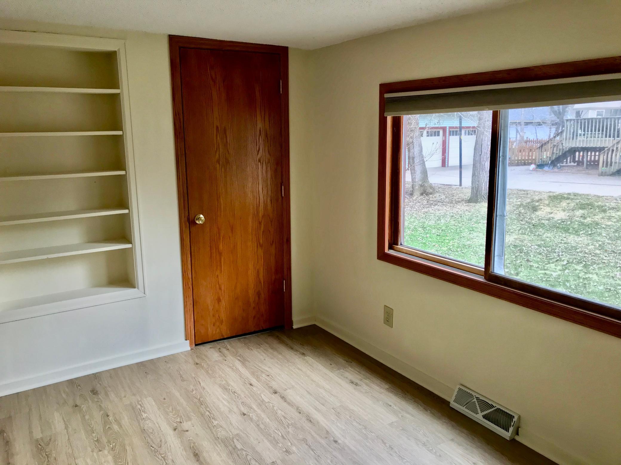 The south bedroom has built-in shelving.