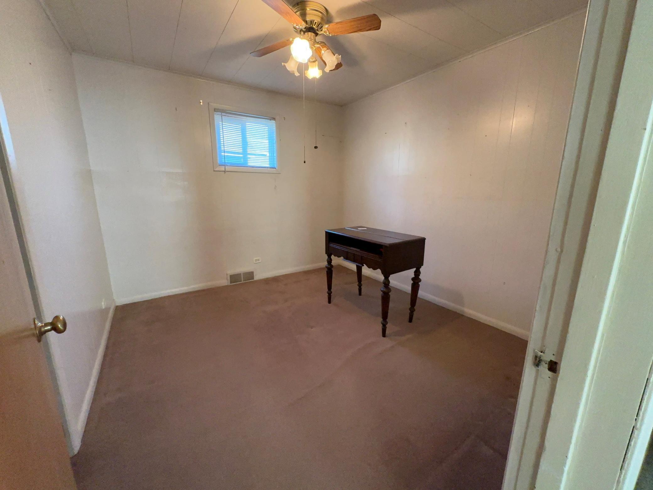 08 Main Level Bedroom 2.jpg