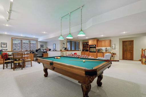 Plenty of room for billiards (pool table stays), cards, currently two desks, and darts. Set it up however you'd like!