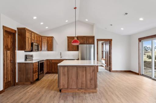 Photos are of a previously completed home with similar design and features. Actual selections, finishes, and materials may vary based on buyer choices and availability.