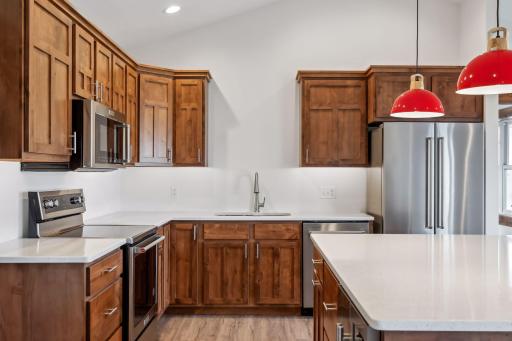 Photos are of a previously completed home with similar design and features. Actual selections, finishes, and materials may vary based on buyer choices and availability.