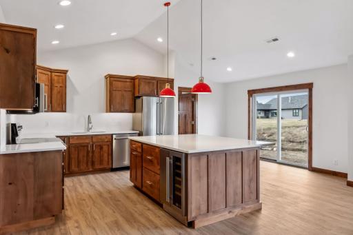 Photos are of a previously completed home with similar design and features. Actual selections, finishes, and materials may vary based on buyer choices and availability.