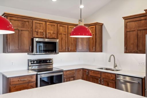 Photos are of a previously completed home with similar design and features. Actual selections, finishes, and materials may vary based on buyer choices and availability.