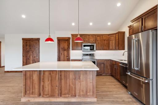 Photos are of a previously completed home with similar design and features. Actual selections, finishes, and materials may vary based on buyer choices and availability.