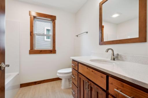 Photos are of a previously completed home with similar design and features. Actual selections, finishes, and materials may vary based on buyer choices and availability.
