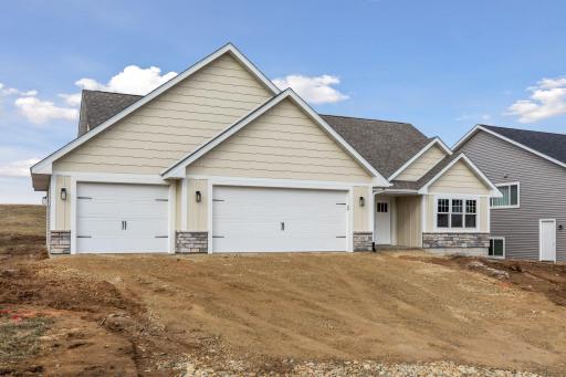 Photos are of a previously completed home with similar design and features. Actual selections, finishes, and materials may vary based on buyer choices and availability.