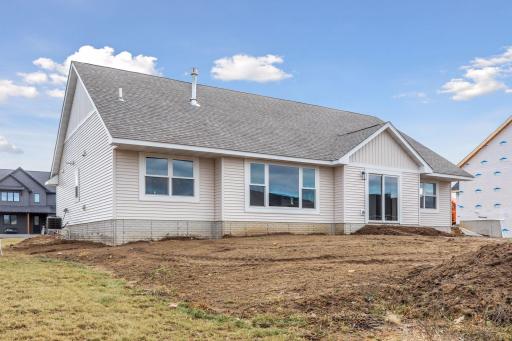 Photos are of a previously completed home with similar design and features. Actual selections, finishes, and materials may vary based on buyer choices and availability.